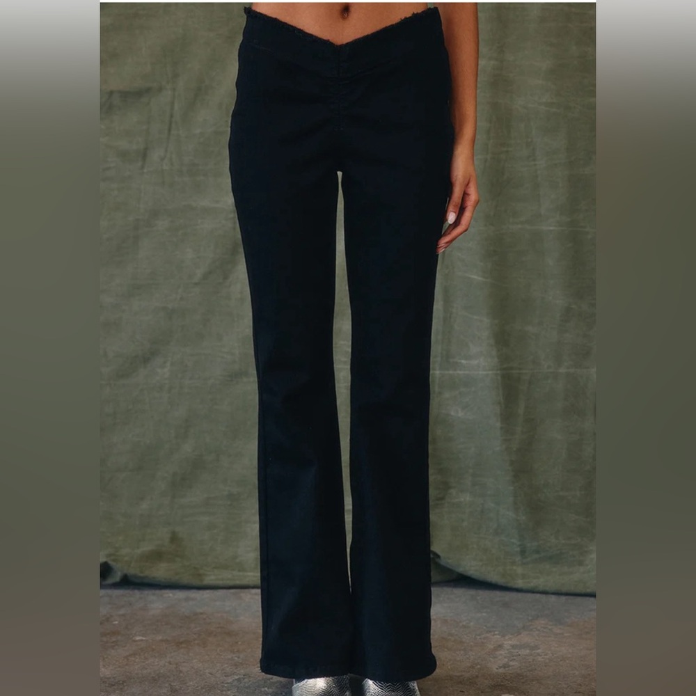 Black west of MELROSE flare jeans with cute detail at the top. Size 24